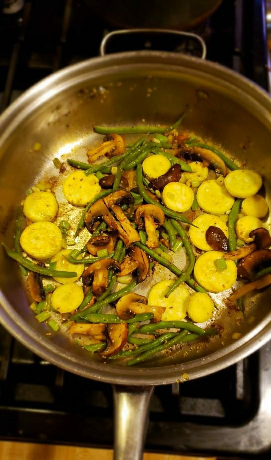 Fresh squash and green beans from the garden with some mushrooms